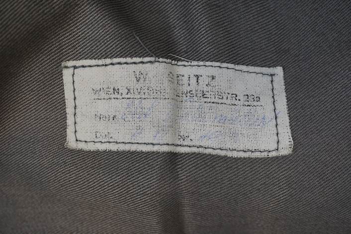 A white label on a black fabric

Description automatically generated