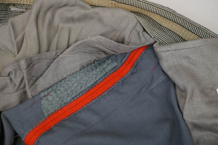 A close-up of a pile of clothes

Description automatically generated